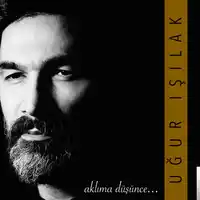 Uğur Işılak – Hayaller Her Zaman Yarıda Kalır Albüm Kapağı